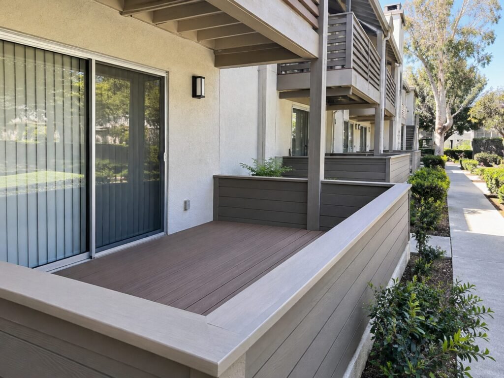 Newly rebuilt composite deck with cap rails at a Sacramento condo after a deck inspection and repair