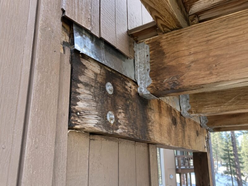 Ledger flashing lapped the wrong way behind a mountain deck