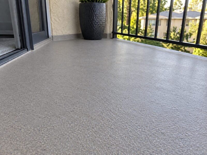 Rebuilt balcony deck with a new membrane and correct drainage at a Walnut Creek association