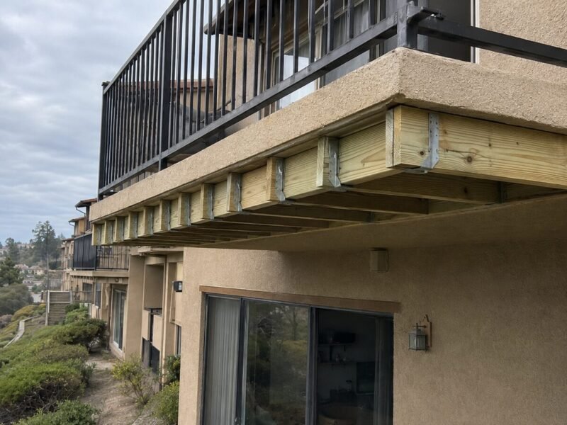 Rebuilt cantilever joists with new hangers before soffit reconstruction